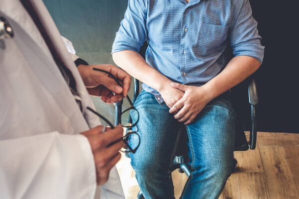 a man with symptoms of prostatitis at the doctor's appointment